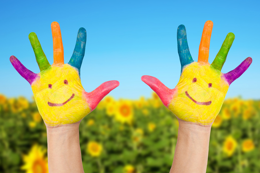 Two Smiley Hands In Sunny Summer's Day.