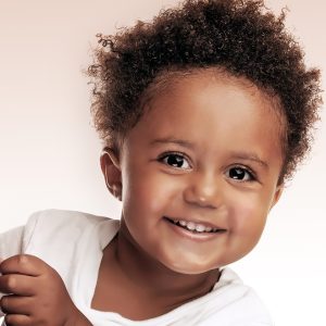 Closeup Portrait Of A Cute Little African American Boy Isolated