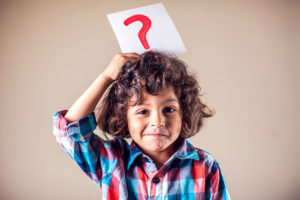 Kid Boy With Question Mark. Children, Education, Emotions Concep