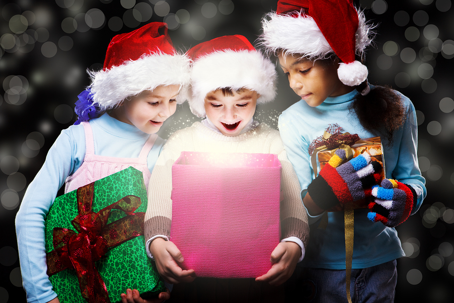bigstock surprised kids in santa hats l 25737509