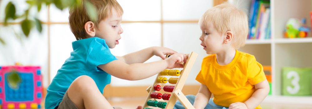 35708967 - children boys play with abacus toy indoors