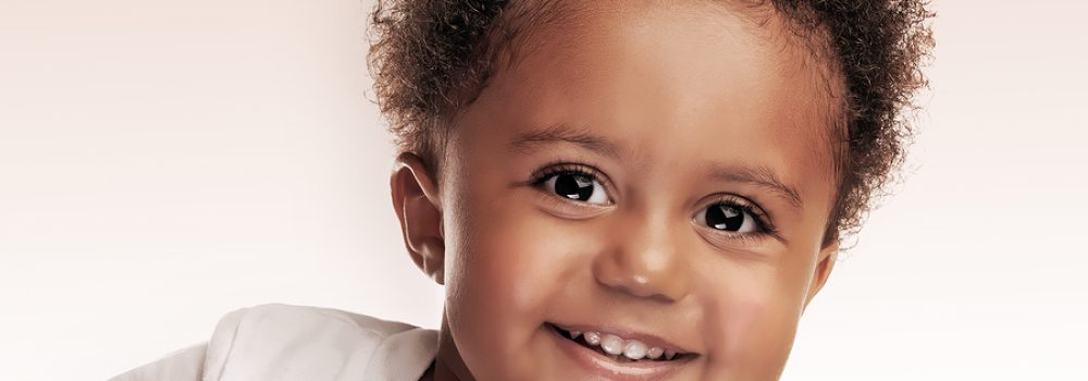 Closeup Portrait Of A Cute Little African American Boy Isolated